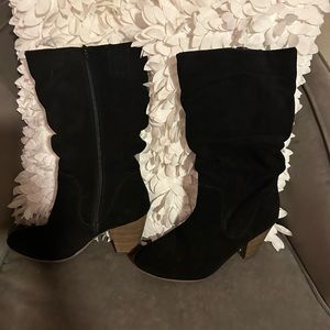 Black slouch mid-calf boots with tan colored wooden heels. Suede. Size 10.